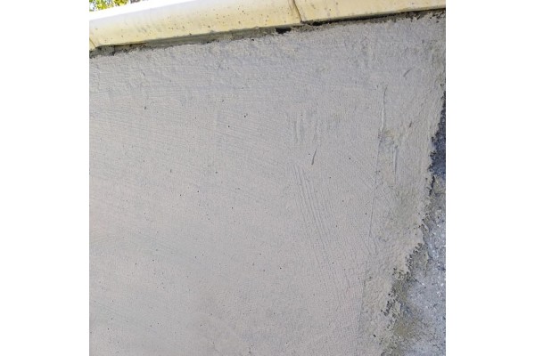 Colocación de la malla de fibra de vidrio con Mortelastic en piscina