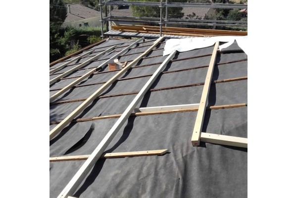 Tela impermeable y transpirable para estructuras de madera