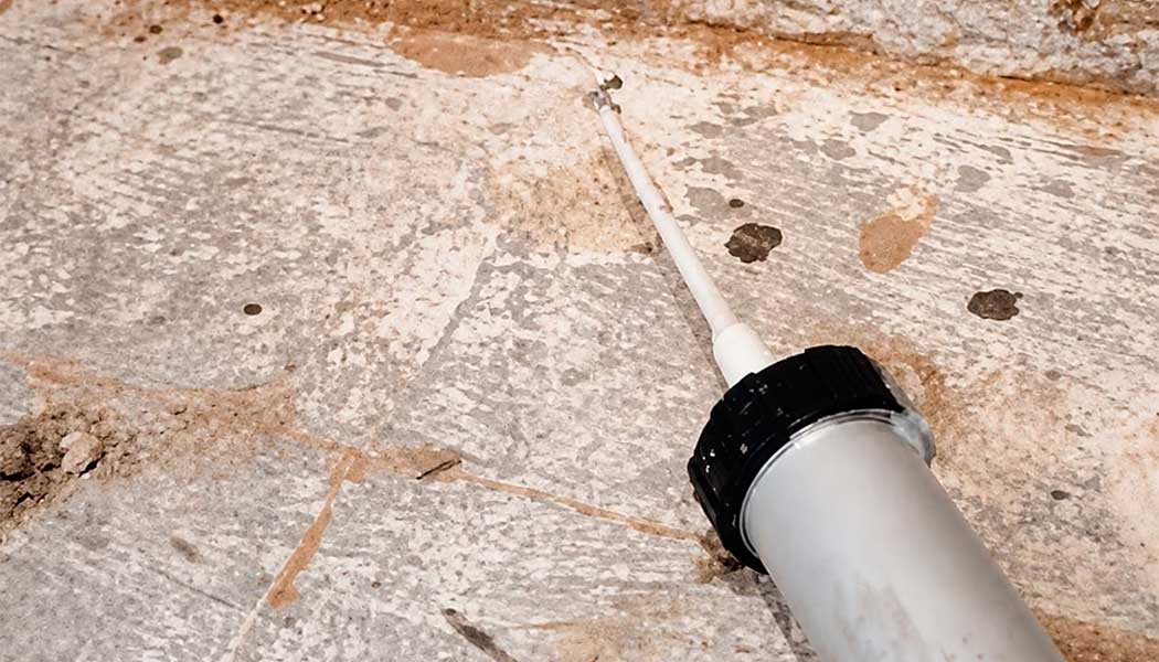 Pistola de calafateo tubular para aplicar productos viscosos