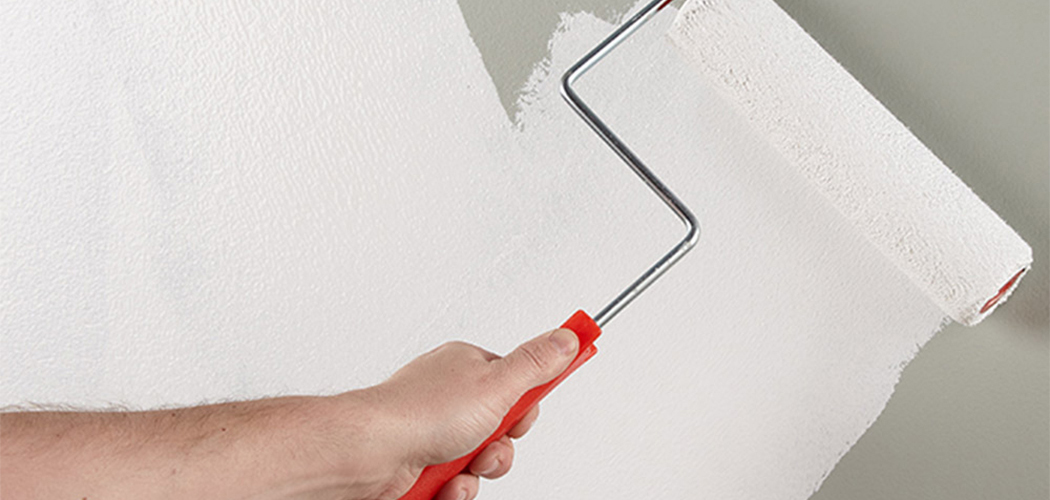 aplicación pintura de cal con rodillo